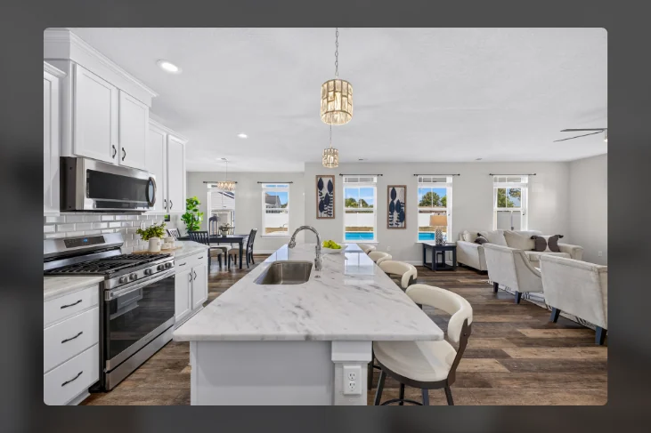 Open-plan kitchen island looking toward the living room
